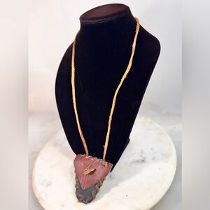 Handmade Leather Pouch necklace.